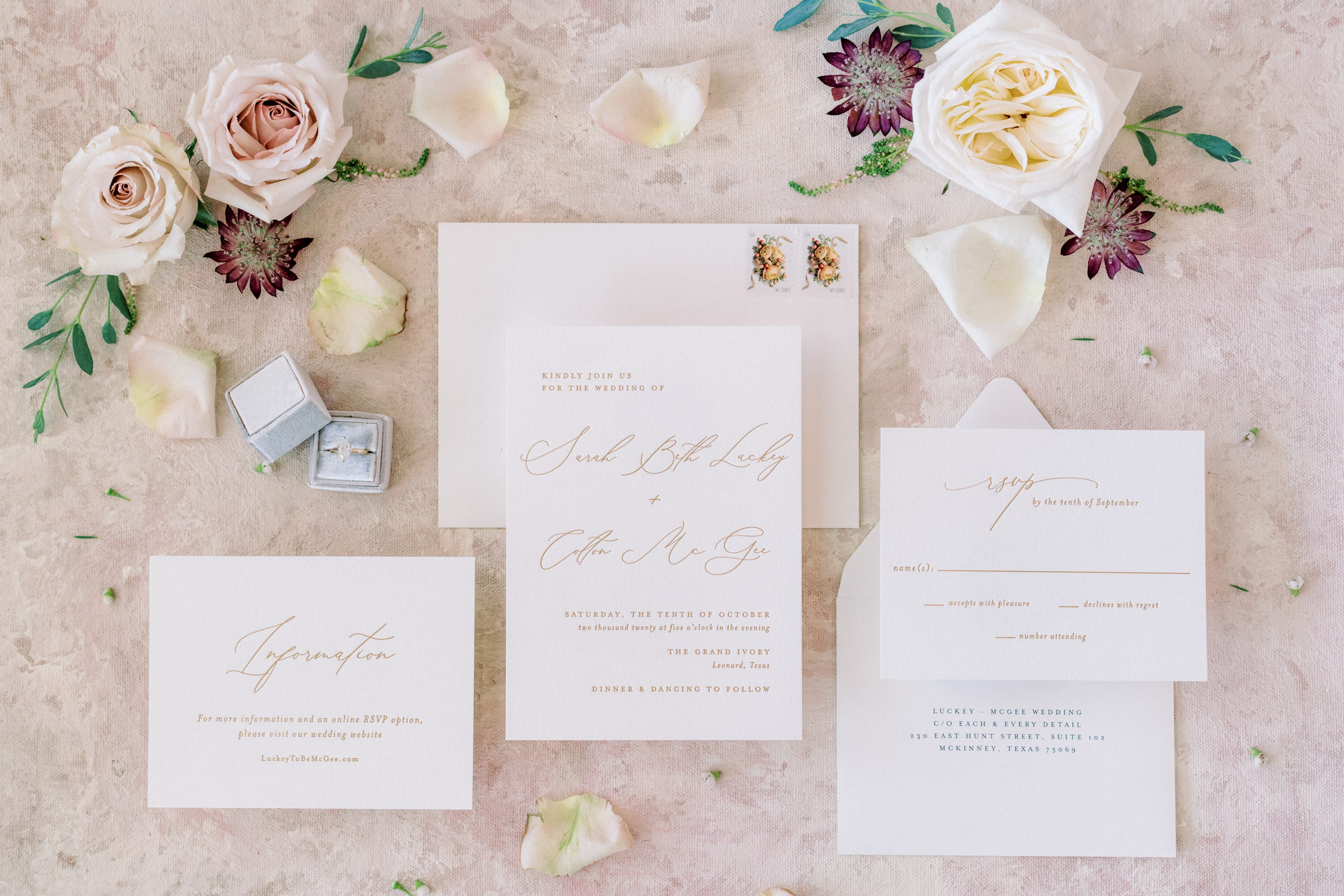 blush invitation flat lay with florals