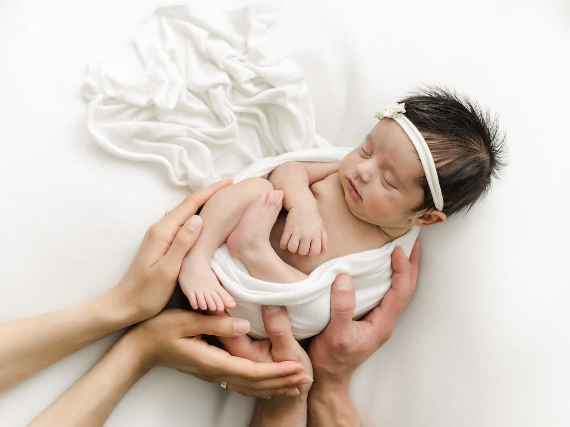 simple newborn photo with hands